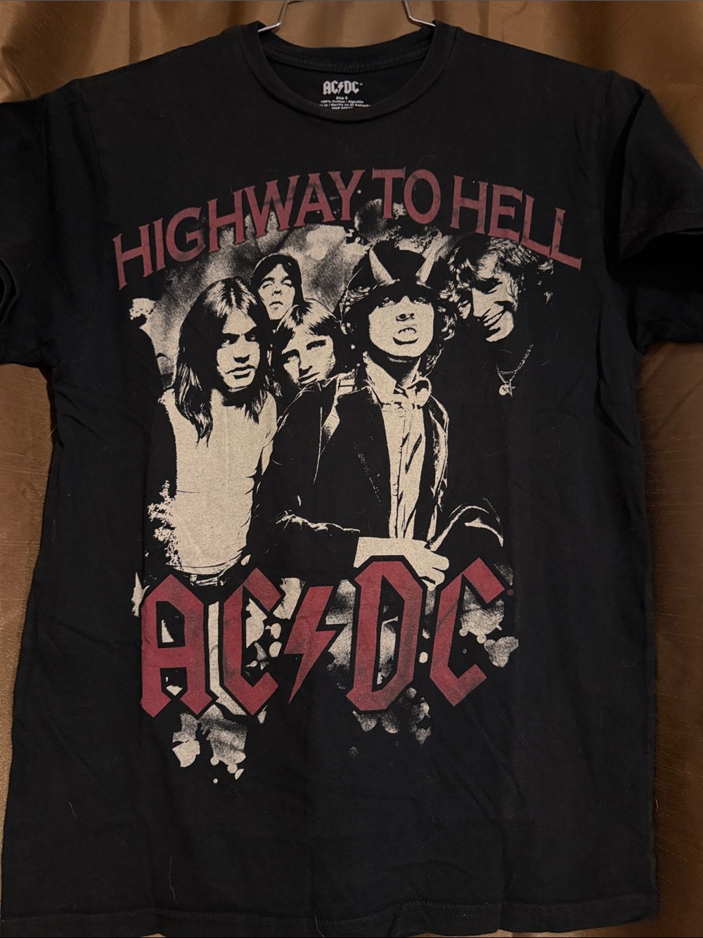 AC/DC "Highway to Hell" graphic t-shirt featuring a vintage band photo and red